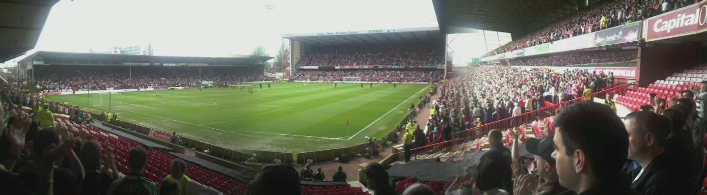 Panoramic view of a packed English football ground