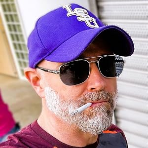 Ryan Foley in a purple LSU cap and sunglasses